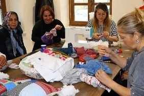 tekstil-atiklarindan-bez-bebek-ve-kiyafet-yaptilar.jpg