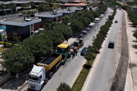 uc-ilcede-14-km-yol-asfaltlaniyor-izmir-buyuksehir-belediyesi-asfalt-atagi-baslatti.jpg